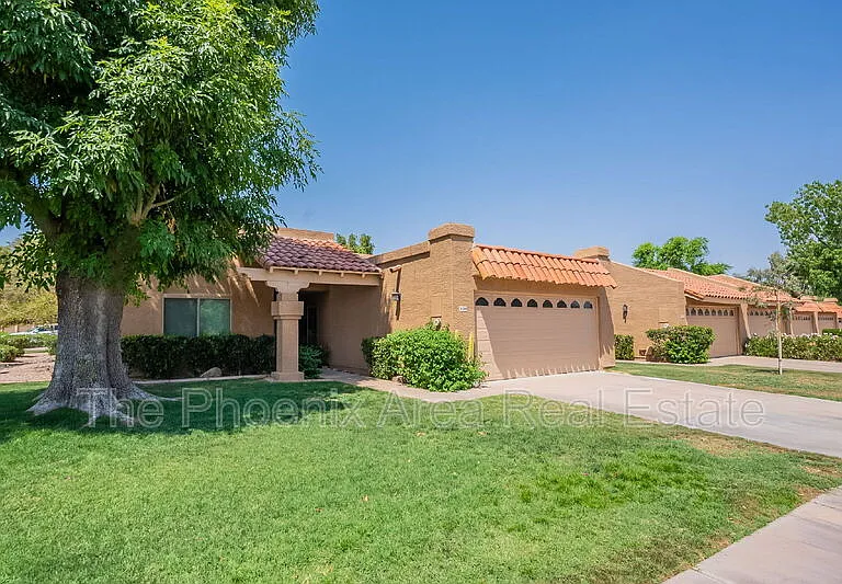 9128 E Gelding Dr — Photo 3
