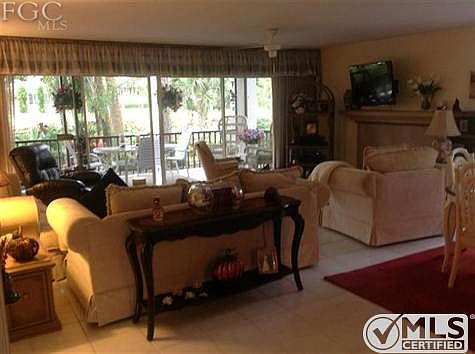 Living Room with sofa, love seat and 3 chairs. Lots of room for family and guests.