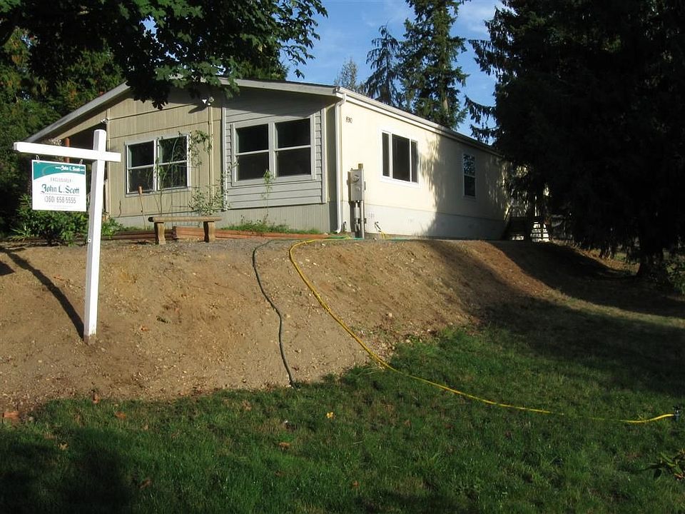 Beautiful Setting for this large Manufactured Home