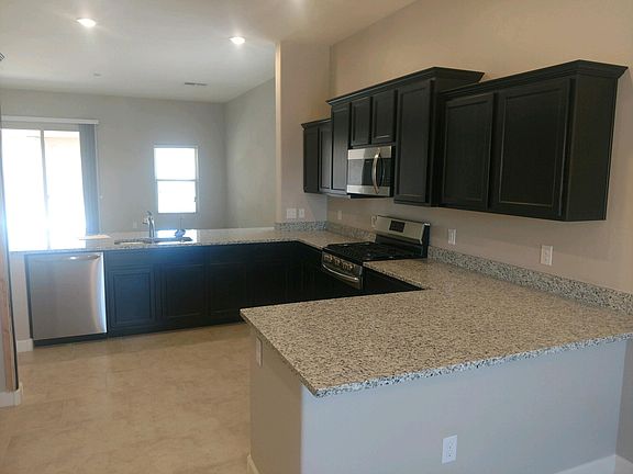 Plenty of counter and cabinet space with granite