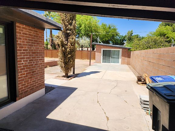 Carport access to backyard, guest quarters