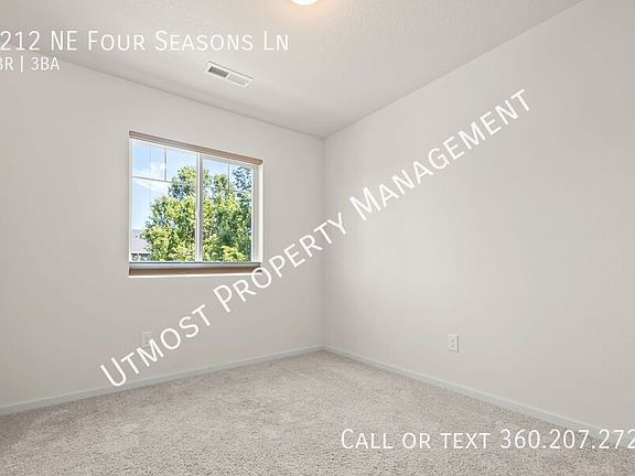 4th image of 2212 NE Four Seasons Ln