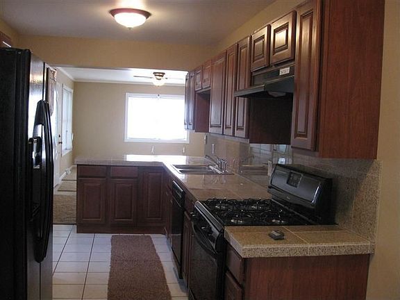 5th image of 1335 W 62nd Ave