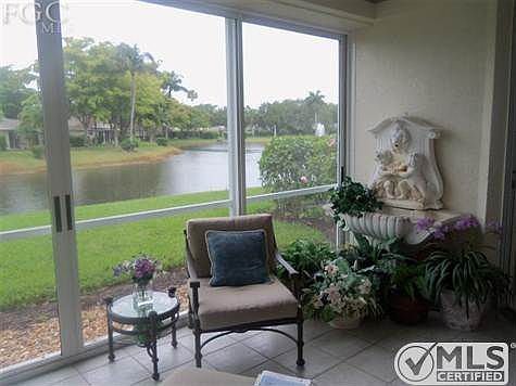 Lanai overlooking lake and fountain.