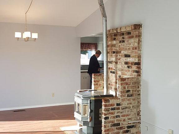 Pellet stove in living/dining room for heat plus forced air furnace.