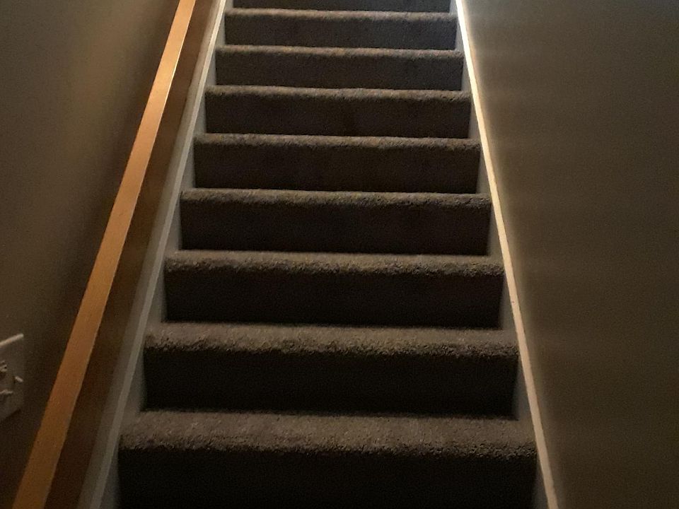 stairway entrance to second floor condo