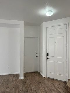 Interior front door and garage entrance.