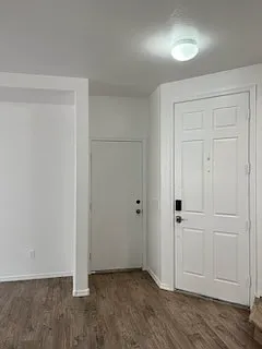 Interior front door and garage entrance.
