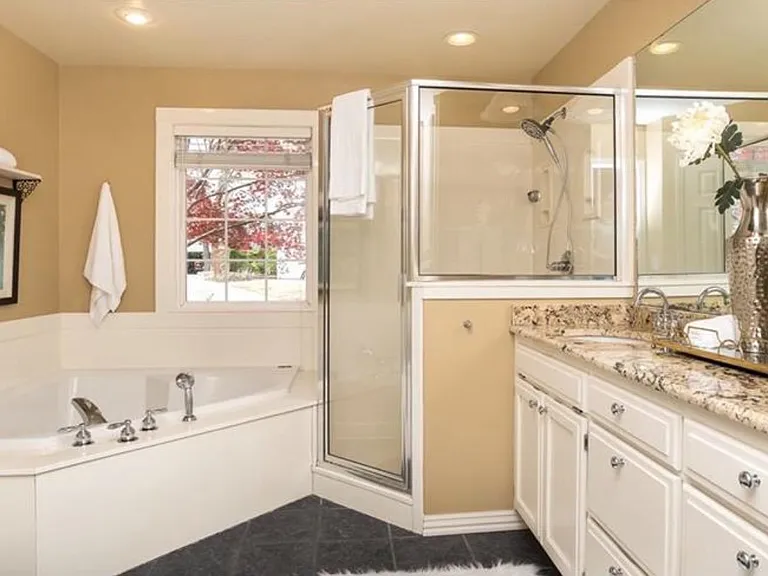 primary bathroom, with two vanities