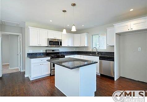 4th image of 7726 Woodbine Way