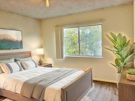 Front bedroom has mirrored closet and sunny south facing window.