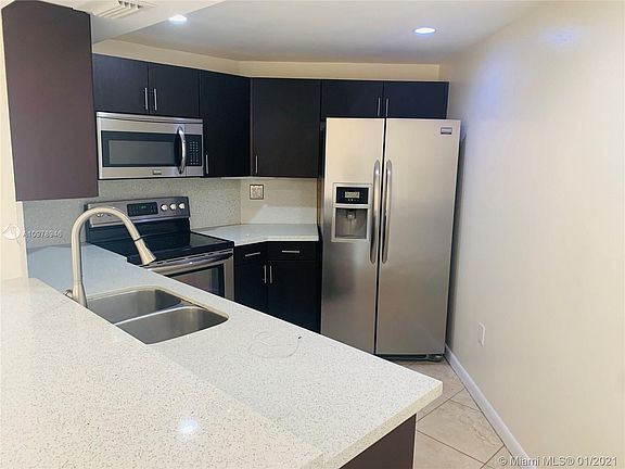 5th image of 9715 Fontainebleau Blvd #E203