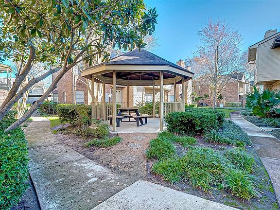 A covered gazebo with picnic bench on the corner of your unit - great place to meet your neighbors and new friends or bring your old friends to hang out.