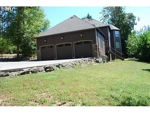 12170 NW Sunningdale Dr photo 1