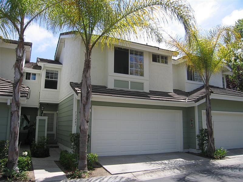 Front with 2 car garage