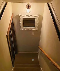 Steps to Upper Level Bedroom