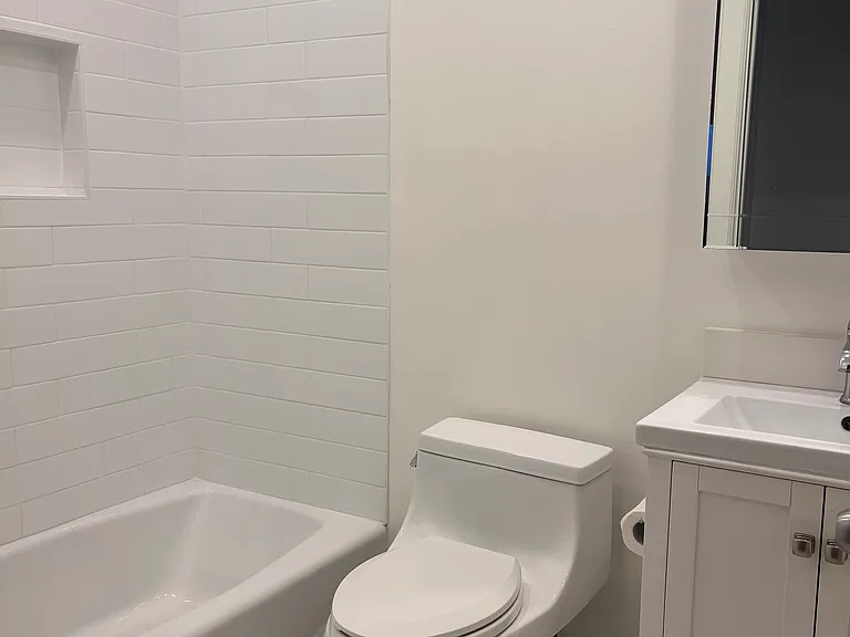The guest bathroom (one of two bathrooms in the unit)