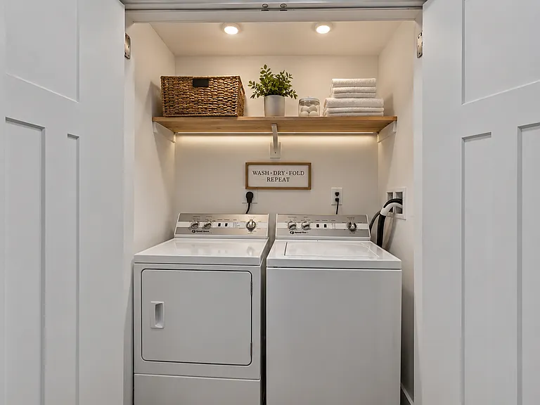 laundry center with full size Speed Queen W/D