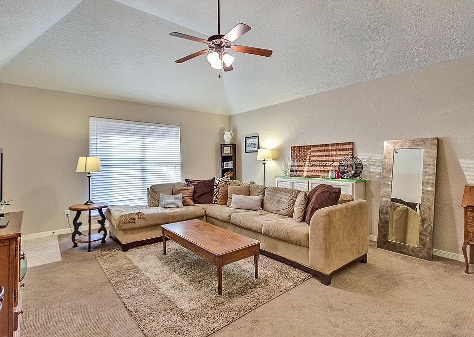 Living Room w/ Vaulted Ceiling