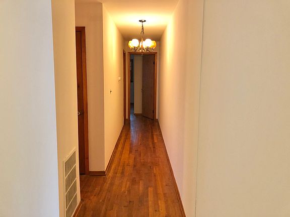 Hallway leading to Bathroom and Bedrooms