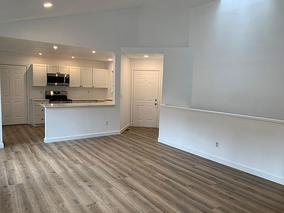 Front door and kitchen from living room