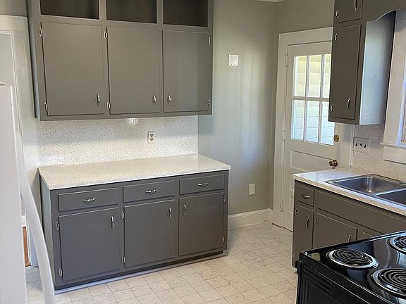 includes stove and fridge