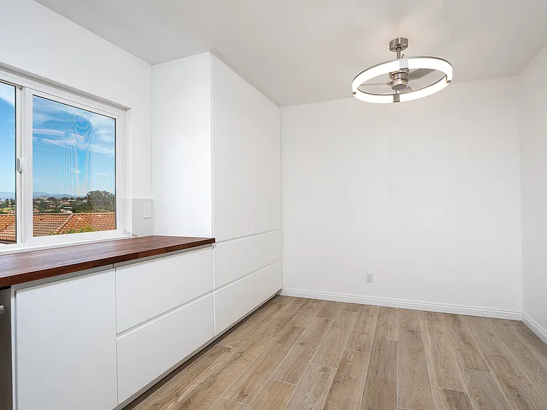 Ample kitchen cupboard space with fully extending, soft-close drawers both in and below the cupboard cabinet doors.