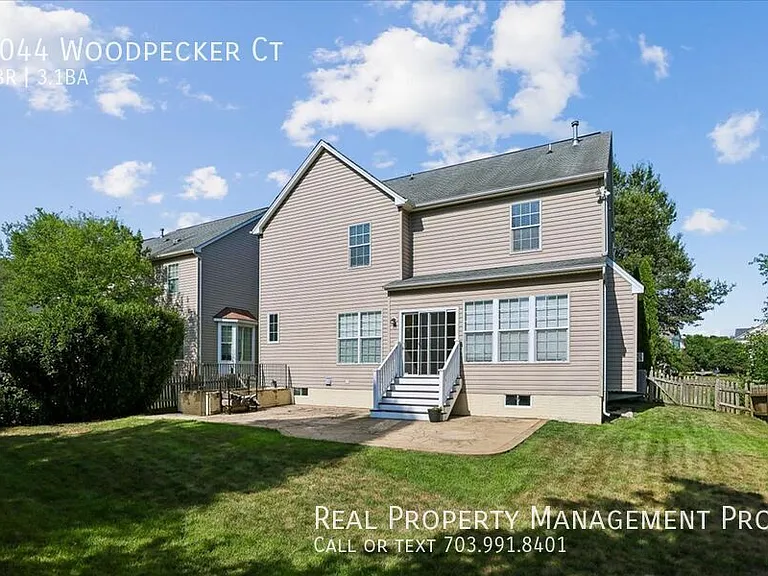 9044 Woodpecker Ct — Photo 35