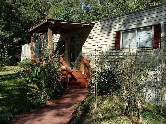 deck with a covered entrance.