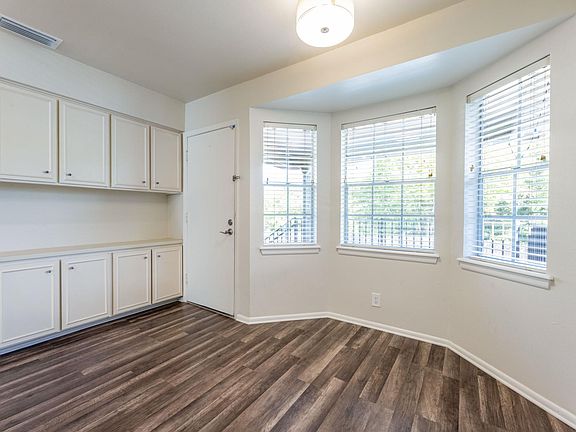 Breakfast area and rear entrance, bay window facing west