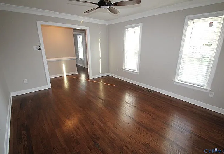 Another view of living room located to the left of the front door entryway