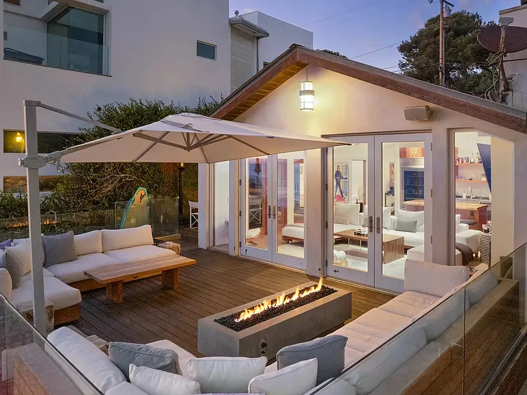 Gather around the outdoor fire pit with friends or family.