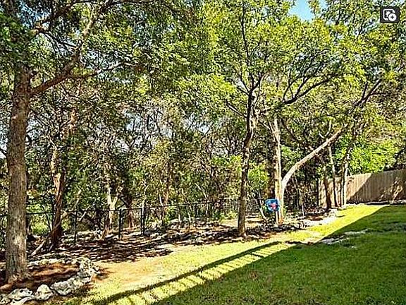 Backyard with lots of privacy and shaded trees