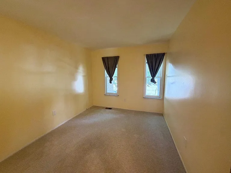 Master bedroom with new carpet in 2026