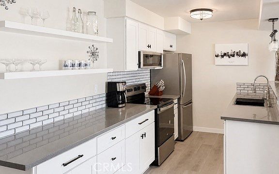 3rd image of 3609 E 2nd St Unit 205