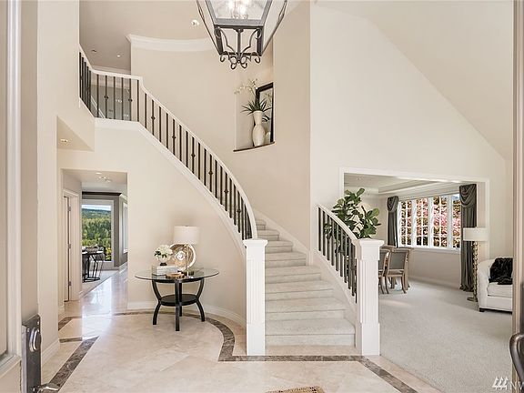 This open entry paired with vaulted ceilings offers the perfect welcoming.