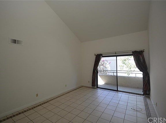 Living Room with sliding door and deck.