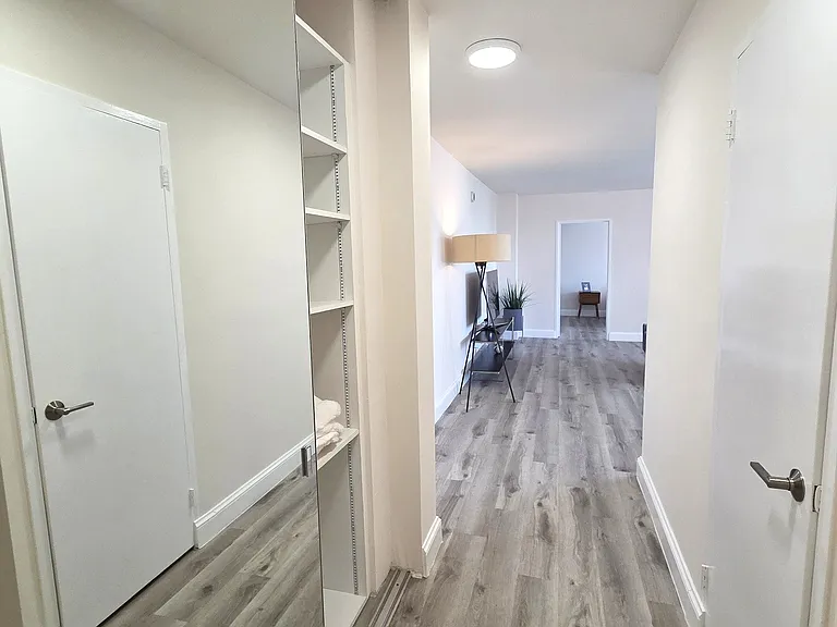 702 hallway with two closets