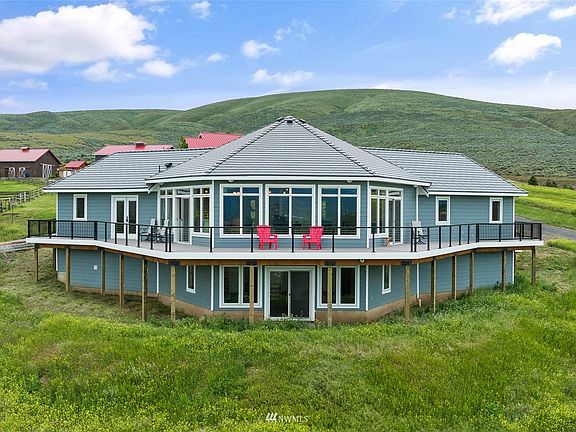 This 2 story build has walls of windows to take advantage of the surrounding views.