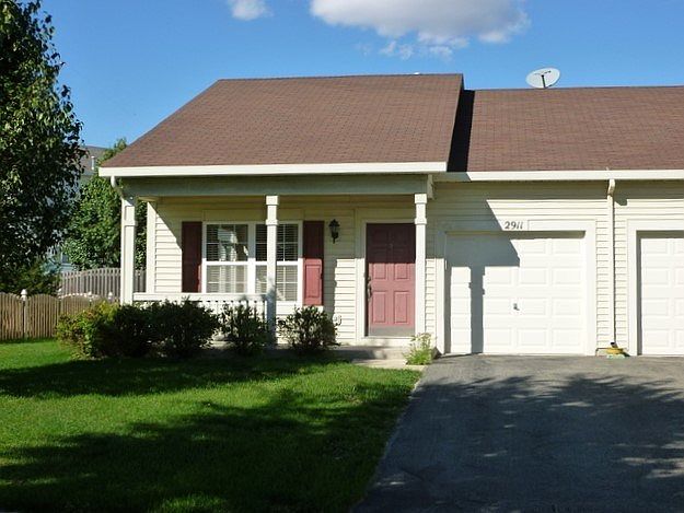 ~Welcome to 2911 Courtney Street~Spring photo taken prior to the removal of the front bushes.