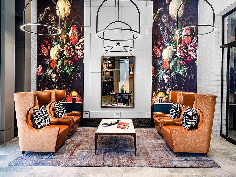 Lobby with large chairs and mirror
