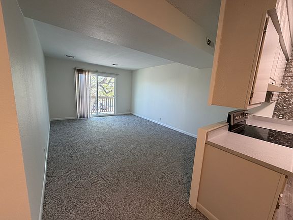 Living Room with balcony. Freshly painted walls