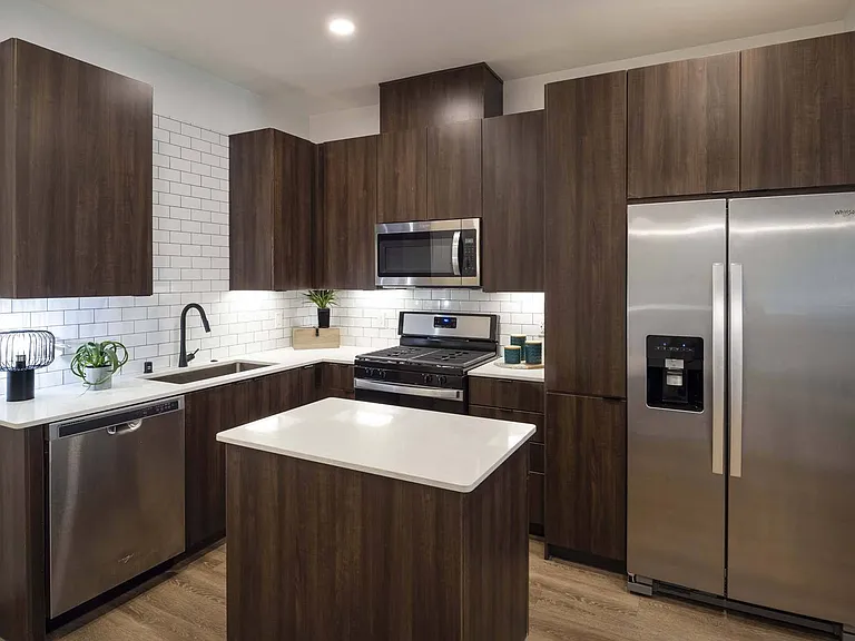 Make meal prep a breeze in a spacious kitchen featuring a large island for added functionality and convenience.