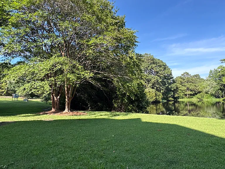 Large yard with mowing/landscaping included.
