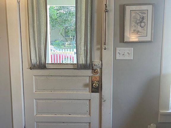 Adorable old school cottage front door.