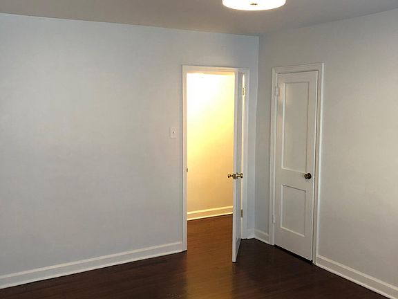 Master bedroom, featuring freshly stained floors, new lighti