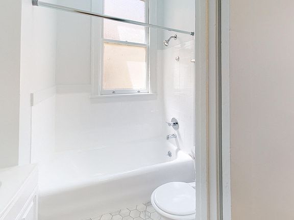 Bathroom with toilet and bathtub