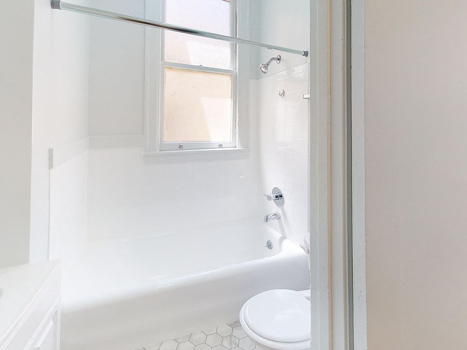 Bathroom with toilet and bathtub