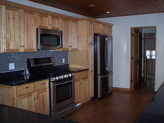 Kitchen with stainless steel applainces