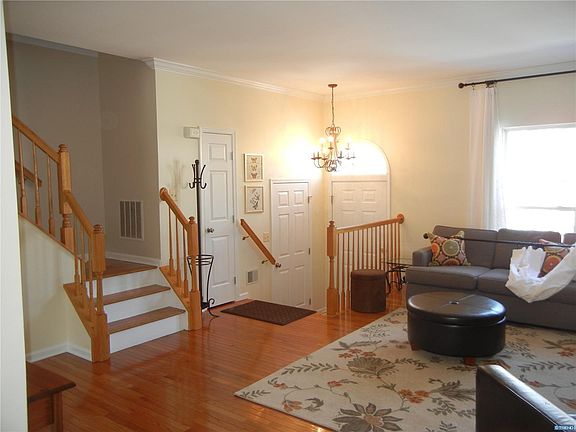 from dining room to foyer, turned staircase